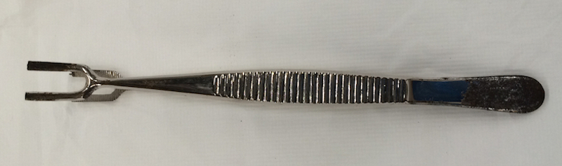 Corrosion on stainless steel medical tweezers after cleaning.